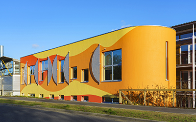 Innovation Studio at the Arts University Bournemouth with a StoSilco exterior render and StoColor Dryonic façade paint finish to create a striking visual façade. Gallery Image