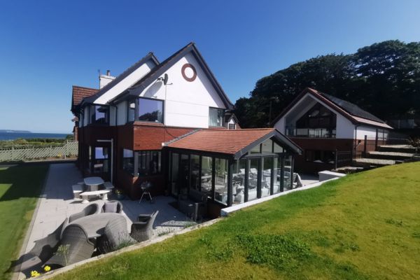 Matching windows, doors and bifold doors finished in anthracite grey Gallery Image